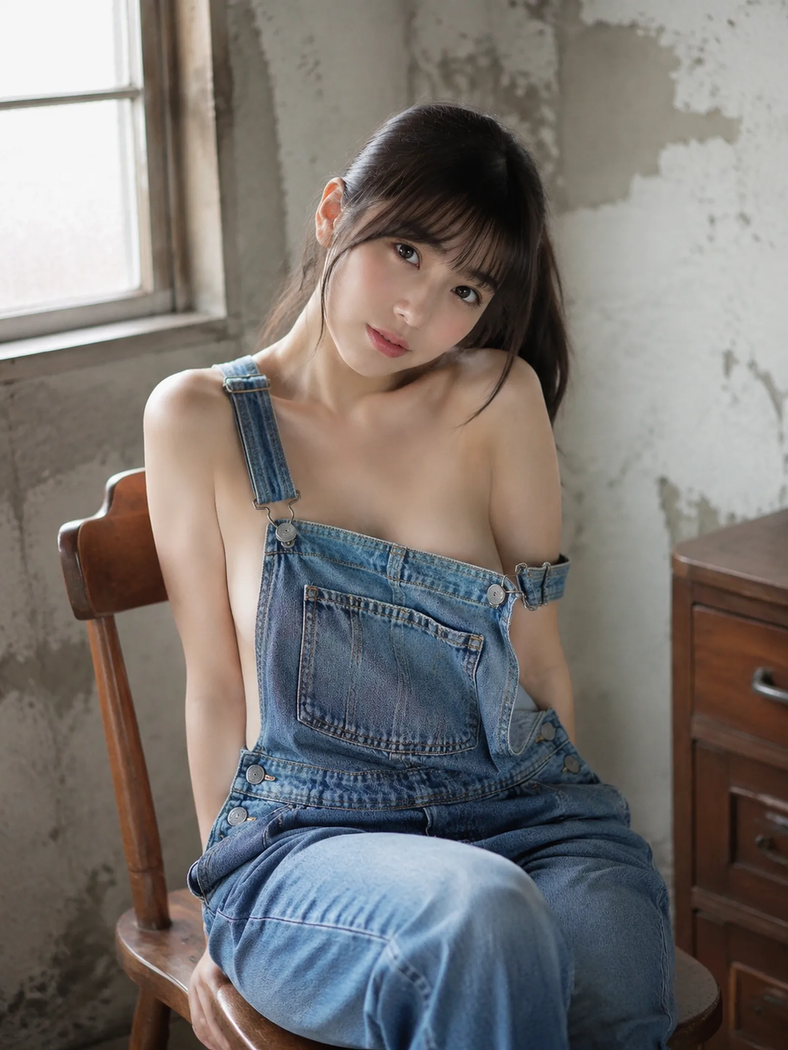 wearing denim overalls over bare skin, b